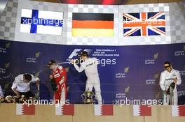 The podium (L to R): Aldo Costa (ITA) Mercedes AMG F1 Engineering Director; Kimi Raikkonen (FIN) Ferrari, second; Nico Rosberg (GER) Mercedes AMG F1, race winner; Lewis Hamilton (GBR) Mercedes AMG F1, third. 03.04.2016. Formula 1 World Championship, Rd 2, Bahrain Grand Prix, Sakhir, Bahrain, Race Day.
