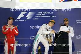 The podium (L to R): Kimi Raikkonen (FIN) Ferrari, second; Nico Rosberg (GER) Mercedes AMG F1, race winner; Lewis Hamilton (GBR) Mercedes AMG F1, third. 03.04.2016. Formula 1 World Championship, Rd 2, Bahrain Grand Prix, Sakhir, Bahrain, Race Day.