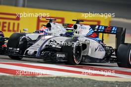 Felipe Massa (BRA) Williams FW38 and Romain Grosjean (FRA) Haas F1 Team VF-16 battle for position. 03.04.2016. Formula 1 World Championship, Rd 2, Bahrain Grand Prix, Sakhir, Bahrain, Race Day.
