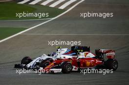 Kimi Raikkonen (FIN) Ferrari SF16-H and Valtteri Bottas (FIN) Williams FW38 battle for position. 03.04.2016. Formula 1 World Championship, Rd 2, Bahrain Grand Prix, Sakhir, Bahrain, Race Day.