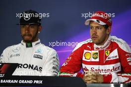 (L to R): Lewis Hamilton (GBR) Mercedes AMG F1 with Sebastian Vettel (GER) Ferrari in the FIA Press Conference. 02.04.2016. Formula 1 World Championship, Rd 2, Bahrain Grand Prix, Sakhir, Bahrain, Qualifying Day.