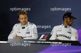(L to R): Nico Rosberg (GER) Mercedes AMG F1 and team mate Lewis Hamilton (GBR) Mercedes AMG F1 in the FIA Press Conference. 02.04.2016. Formula 1 World Championship, Rd 2, Bahrain Grand Prix, Sakhir, Bahrain, Qualifying Day.