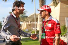 (L to R): Mark Webber (AUS) Porsche Team WEC Driver / Channel 4 Presenter with Marc Gene (ESP) Ferrari Test Driver. 03.04.2016. Formula 1 World Championship, Rd 2, Bahrain Grand Prix, Sakhir, Bahrain, Race Day.