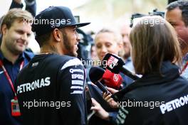 Lewis Hamilton (GBR) Mercedes AMG F1 with the media. 31.03.2016. Formula 1 World Championship, Rd 2, Bahrain Grand Prix, Sakhir, Bahrain, Preparation Day.