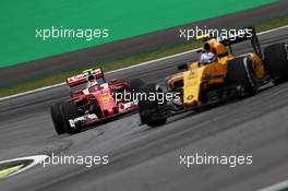 Kimi Raikkonen (FIN) Ferrari SF16-H follows Jolyon Palmer (GBR) Renault Sport F1 Team RS16. 11.11.2016. Formula 1 World Championship, Rd 20, Brazilian Grand Prix, Sao Paulo, Brazil, Practice Day.