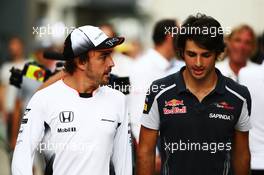 (L to R): Fernando Alonso (ESP) McLaren with Carlos Sainz Jr (ESP) Scuderia Toro Rosso. 11.11.2016. Formula 1 World Championship, Rd 20, Brazilian Grand Prix, Sao Paulo, Brazil, Practice Day.