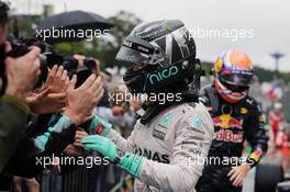 Nico Rosberg (GER) Mercedes AMG F1 celebrates his second position with the team in parc ferme. 13.11.2016. Formula 1 World Championship, Rd 20, Brazilian Grand Prix, Sao Paulo, Brazil, Race Day.