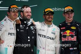 The podium (L to R): Nico Rosberg (GER) Mercedes AMG F1, second; Bradley Lord (GBR) Mercedes AMG F1 Communications Manager; Lewis Hamilton (GBR) Mercedes AMG F1, race winner; Max Verstappen (NLD) Red Bull Racing, third. 13.11.2016. Formula 1 World Championship, Rd 20, Brazilian Grand Prix, Sao Paulo, Brazil, Race Day.