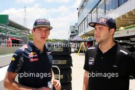 (L to R): Max Verstappen (NLD) Red Bull Racing with Felipe Fraga (BRA) Stock Car Driver 10.11.2016. Formula 1 World Championship, Rd 20, Brazilian Grand Prix, Sao Paulo, Brazil, Preparation Day.