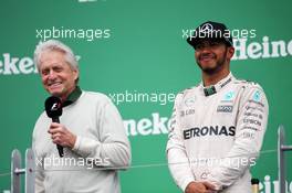 (L to R): Michael Douglas (USA) Actor on the podium with race winner Lewis Hamilton (GBR) Mercedes AMG F1. 12.06.2016. Formula 1 World Championship, Rd 7, Canadian Grand Prix, Montreal, Canada, Race Day.
