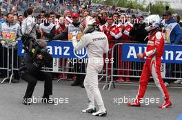 Race winner Lewis Hamilton (GBR) Mercedes AMG F1 celebrates in parc ferme with Sebastian Vettel (GER) Ferrari. 12.06.2016. Formula 1 World Championship, Rd 7, Canadian Grand Prix, Montreal, Canada, Race Day.