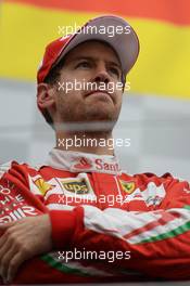 Sebastian Vettel (GER) Ferrari on the podium. 12.06.2016. Formula 1 World Championship, Rd 7, Canadian Grand Prix, Montreal, Canada, Race Day.