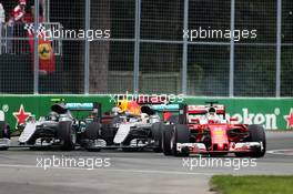 Sebastian Vettel (GER) Ferrari SF16-H leads  Lewis Hamilton (GBR) Mercedes AMG F1 W07 Hybrid and Nico Rosberg (GER) Mercedes AMG F1 W07 Hybrid at the start of the race. 12.06.2016. Formula 1 World Championship, Rd 7, Canadian Grand Prix, Montreal, Canada, Race Day.