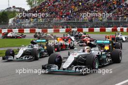 Lewis Hamilton (GBR) Mercedes AMG F1 W07 Hybrid and team mate Nico Rosberg (GER) Mercedes AMG F1 W07 Hybrid at the start of the race. 12.06.2016. Formula 1 World Championship, Rd 7, Canadian Grand Prix, Montreal, Canada, Race Day.