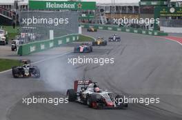 Romain Grosjean (FRA) Haas F1 Team VF-16 locks up under braking. 12.06.2016. Formula 1 World Championship, Rd 7, Canadian Grand Prix, Montreal, Canada, Race Day.