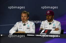 (L to R): Nico Rosberg (GER) Mercedes AMG F1 and team mate Lewis Hamilton (GBR) Mercedes AMG F1 in the FIA Press Conference. 11.06.2016. Formula 1 World Championship, Rd 7, Canadian Grand Prix, Montreal, Canada, Qualifying Day.