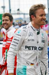 Nico Rosberg (GER) Mercedes AMG F1 and Sebastian Vettel (GER) Ferrari in parc ferme. 11.06.2016. Formula 1 World Championship, Rd 7, Canadian Grand Prix, Montreal, Canada, Qualifying Day.