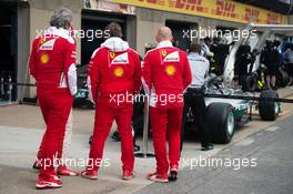 The Ferrari team take a look at the Mercedes AMG F1 W07 Hybrid. 09.06.2016. Formula 1 World Championship, Rd 7, Canadian Grand Prix, Montreal, Canada, Preparation Day.