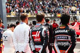 Sergio Perez (MEX) Sahara Force India F1 as the grid observes the national anthem. 17.04.2016. Formula 1 World Championship, Rd 3, Chinese Grand Prix, Shanghai, China, Race Day.