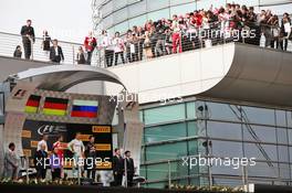 The podium (L to R): Sebastian Vettel (GER) Ferrari, second; Nico Rosberg (GER) Mercedes AMG F1, race winner; Daniil Kvyat (RUS) Red Bull Racing, third. 17.04.2016. Formula 1 World Championship, Rd 3, Chinese Grand Prix, Shanghai, China, Race Day.