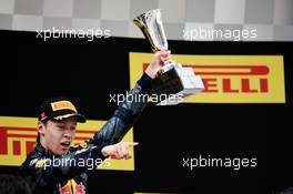 Daniil Kvyat (RUS) Red Bull Racing celebrates his third position on the podium. 17.04.2016. Formula 1 World Championship, Rd 3, Chinese Grand Prix, Shanghai, China, Race Day.