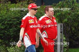 (L to R): Kimi Raikkonen (FIN) Ferrari with Dave Greenwood (GBR) Ferrari Race Engineer. 14.04.2016. Formula 1 World Championship, Rd 3, Chinese Grand Prix, Shanghai, China, Preparation Day.
