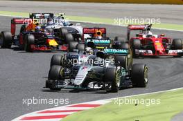 Nico Rosberg (GER) Mercedes AMG F1 W07 Hybrid leads team mate Lewis Hamilton (GBR) Mercedes AMG F1 W07 Hybrid at the start of the race. 15.05.2016. Formula 1 World Championship, Rd 5, Spanish Grand Prix, Barcelona, Spain, Race Day.