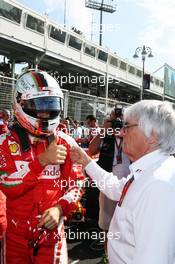(L to R): Sebastian Vettel (GER) Ferrari with Bernie Ecclestone (GBR) on the grid. 19.06.2016. Formula 1 World Championship, Rd 8, European Grand Prix, Baku Street Circuit, Azerbaijan, Race Day.