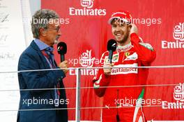 (L to R): Eddie Jordan (IRE) on the podium with second placed Sebastian Vettel (GER) Ferrari. 19.06.2016. Formula 1 World Championship, Rd 8, European Grand Prix, Baku Street Circuit, Azerbaijan, Race Day.