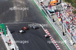 (L to R): Valtteri Bottas (FIN) Williams FW38, Max Verstappen (NLD) Red Bull Racing RB12, and Lewis Hamilton (GBR) Mercedes AMG F1 W07 Hybrid, battle for position. 19.06.2016. Formula 1 World Championship, Rd 8, European Grand Prix, Baku Street Circuit, Azerbaijan, Race Day.