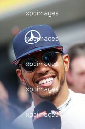 Lewis Hamilton (GBR) Mercedes AMG F1 with the media. 10.07.2016. Formula 1 World Championship, Rd 10, British Grand Prix, Silverstone, England, Race Day.