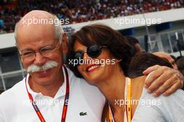 Dr. Dieter Zetsche (GER) Daimler AG CEO on the grid with his wife Gisele Zetsche. 31.07.2016. Formula 1 World Championship, Rd 12, German Grand Prix, Hockenheim, Germany, Race Day.