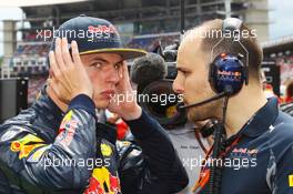 (L to R): Max Verstappen (NLD) Red Bull Racing with Gianpiero Lambiase (ITA) Red Bull Racing Engineer on the grid. 31.07.2016. Formula 1 World Championship, Rd 12, German Grand Prix, Hockenheim, Germany, Race Day.