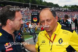 (L to R): Christian Horner (GBR) Red Bull Racing Team Principal with Frederic Vasseur (FRA) Renault Sport F1 Team Racing Director on the grid. 31.07.2016. Formula 1 World Championship, Rd 12, German Grand Prix, Hockenheim, Germany, Race Day.