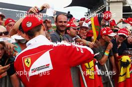 Sebastian Vettel (GER) Ferrari signs autographs for the fans. 30.07.2016. Formula 1 World Championship, Rd 12, German Grand Prix, Hockenheim, Germany, Qualifying Day.