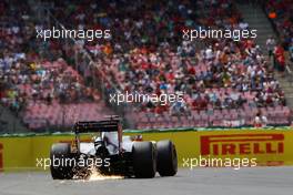 Romain Grosjean (FRA) Haas F1 Team VF-16 sends sparks flying. 30.07.2016. Formula 1 World Championship, Rd 12, German Grand Prix, Hockenheim, Germany, Qualifying Day.