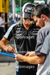 Sergio Perez (MEX) Sahara Force India F1 signs autographs for the fans. 30.07.2016. Formula 1 World Championship, Rd 12, German Grand Prix, Hockenheim, Germany, Qualifying Day.