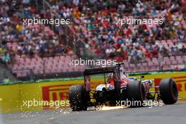 Carlos Sainz Jr (ESP) Scuderia Toro Rosso STR11 sends sparks flying. 30.07.2016. Formula 1 World Championship, Rd 12, German Grand Prix, Hockenheim, Germany, Qualifying Day.