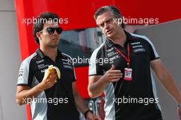 (L to R): Sergio Perez (MEX) Sahara Force India F1 with Andy Stevenson (GBR) Sahara Force India F1 Team Manager. 22.07.2016. Formula 1 World Championship, Rd 11, Hungarian Grand Prix, Budapest, Hungary, Practice Day.
