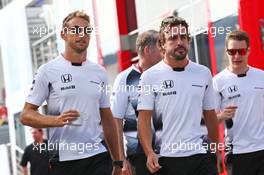 (L to R): Jenson Button (GBR) McLaren with team mate Fernando Alonso (ESP) McLaren. 22.07.2016. Formula 1 World Championship, Rd 11, Hungarian Grand Prix, Budapest, Hungary, Practice Day.