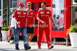 (L to R): Kimi Raikkonen (FIN) Ferrari with Sebastian Vettel (GER) Ferrari and Diego Ioverno (ITA) Ferrari Operations Director. 22.07.2016. Formula 1 World Championship, Rd 11, Hungarian Grand Prix, Budapest, Hungary, Practice Day.