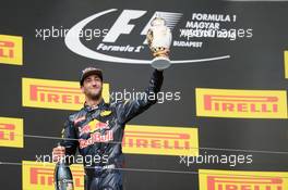 Daniel Ricciardo (AUS) Red Bull Racing celebrates his third position on the podium. 24.07.2016. Formula 1 World Championship, Rd 11, Hungarian Grand Prix, Budapest, Hungary, Race Day.