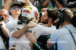 Race winner Lewis Hamilton (GBR) Mercedes AMG F1 celebrates with the team in parc ferme. 24.07.2016. Formula 1 World Championship, Rd 11, Hungarian Grand Prix, Budapest, Hungary, Race Day.