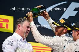 Ron Meadows (GBR) Mercedes GP Team Manager celebrates on the podium with Lewis Hamilton (GBR) Mercedes AMG F1 and Nico Rosberg (GER) Mercedes AMG F1. 24.07.2016. Formula 1 World Championship, Rd 11, Hungarian Grand Prix, Budapest, Hungary, Race Day.