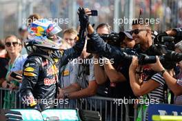 Daniel Ricciardo (AUS) Red Bull Racing celebrates his third position with the team in parc ferme. 24.07.2016. Formula 1 World Championship, Rd 11, Hungarian Grand Prix, Budapest, Hungary, Race Day.