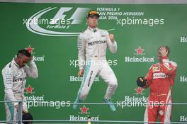 The podium (L to R): Lewis Hamilton (GBR) Mercedes AMG F1, second; Nico Rosberg (GER) Mercedes AMG F1, race winner; Sebastian Vettel (GER) Ferrari, third. 04.09.2016. Formula 1 World Championship, Rd 14, Italian Grand Prix, Monza, Italy, Race Day.