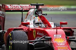 Sebastian Vettel (GER) Ferrari celebrates his third position at the end of the race. 04.09.2016. Formula 1 World Championship, Rd 14, Italian Grand Prix, Monza, Italy, Race Day.