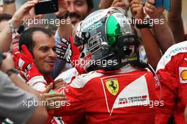 Sebastian Vettel (GER) Ferrari celebrates his third position with the team in parc ferme. 04.09.2016. Formula 1 World Championship, Rd 14, Italian Grand Prix, Monza, Italy, Race Day.