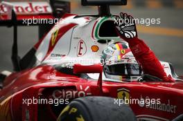 Sebastian Vettel (GER) Ferrari celebrates his third position at the end of the race. 04.09.2016. Formula 1 World Championship, Rd 14, Italian Grand Prix, Monza, Italy, Race Day.
