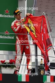 Sebastian Vettel (GER) Ferrari celebrates his third position on the podium. 04.09.2016. Formula 1 World Championship, Rd 14, Italian Grand Prix, Monza, Italy, Race Day.